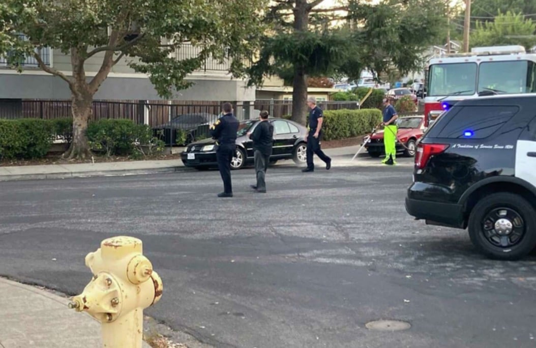 Woman Beheaded with Sword in Front of Onlookers